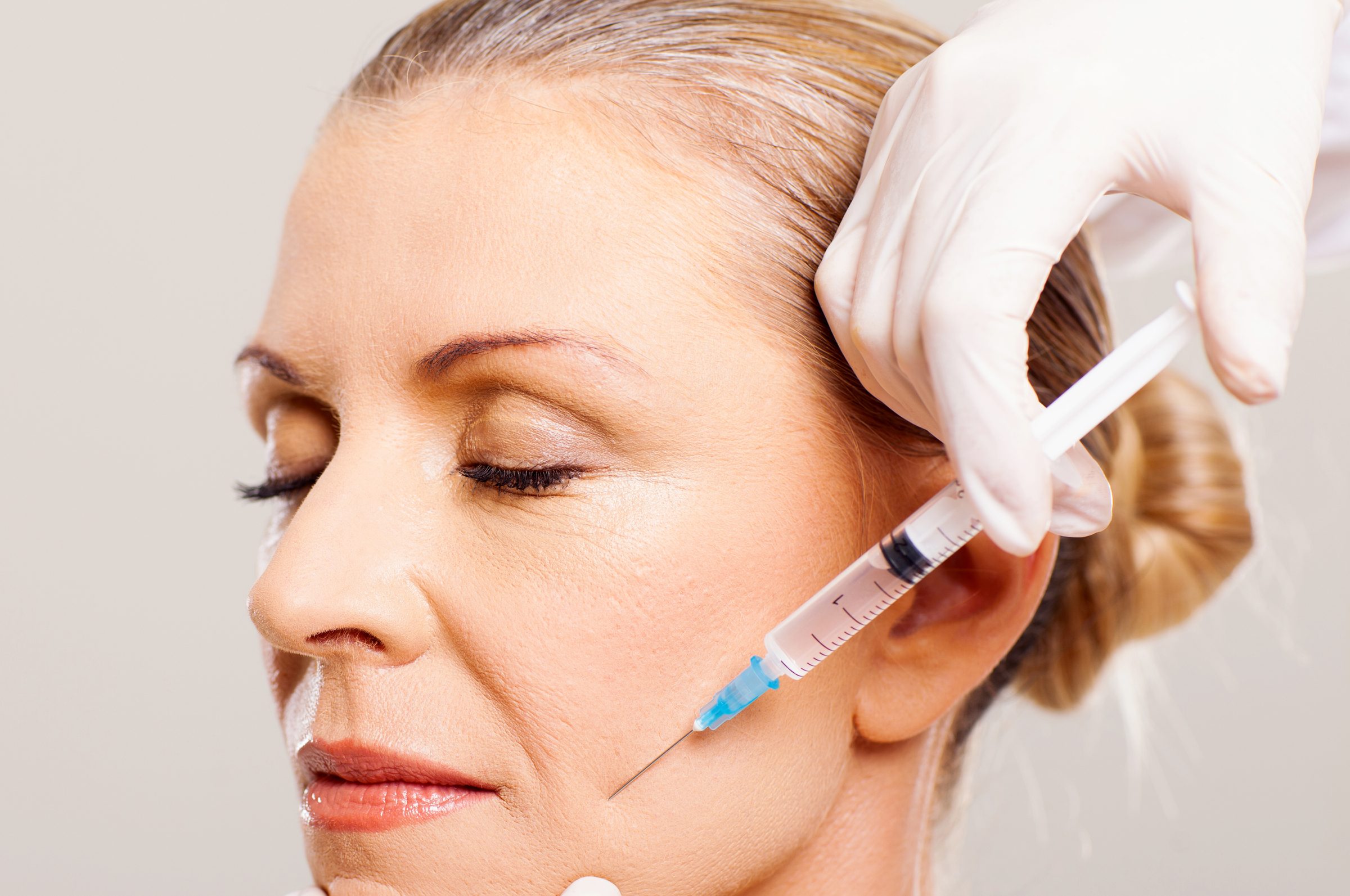 Woman getting injectable treatment